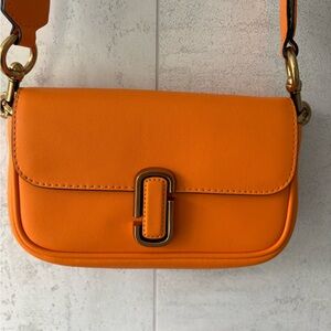Marc Jacobs Orange Crossbody Bag with Minimalist Design